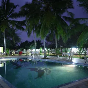 https://resort-the-travancore-palace-beach.kerala-hotels.net
